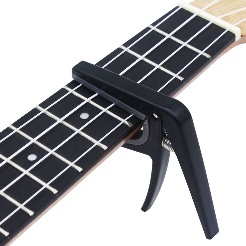Musical Instrument Hawaii - Profesjonalny czarny Ukulele Capo zmień Tuner